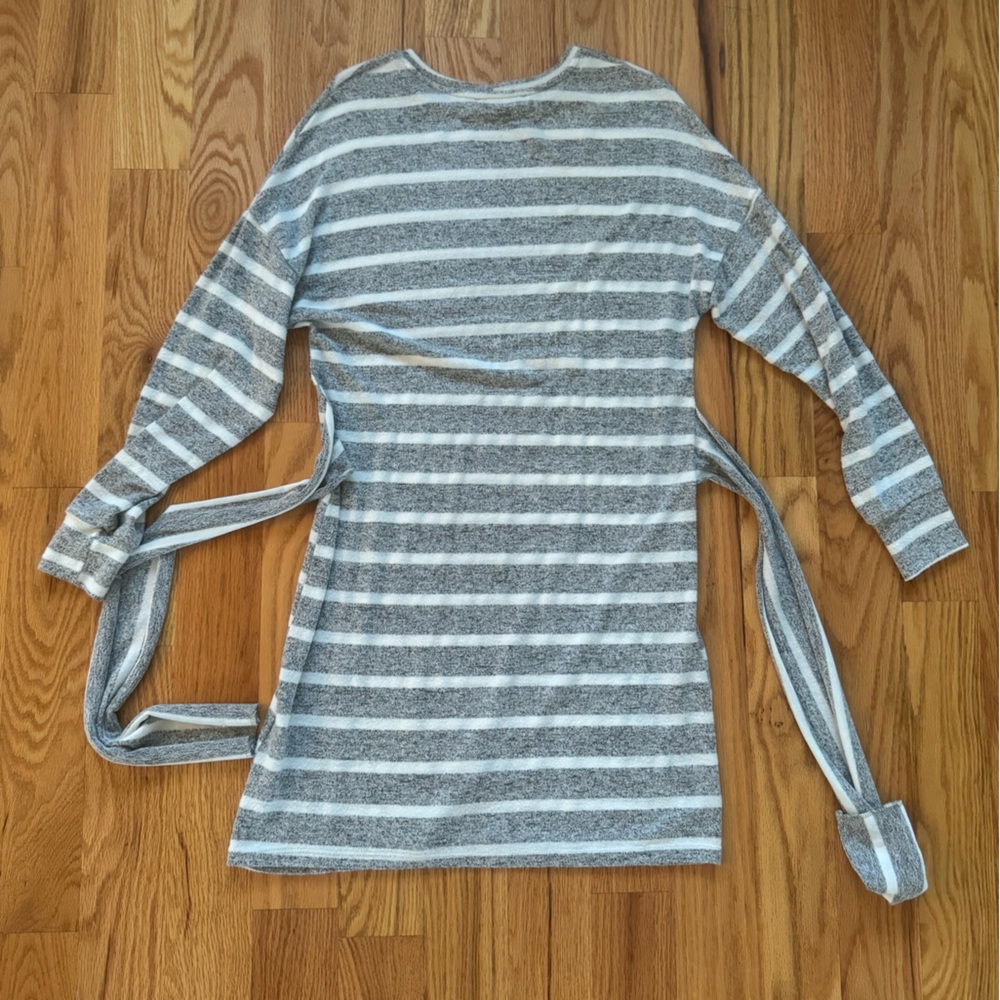 Gray and white striped long sleeve sweater dress.